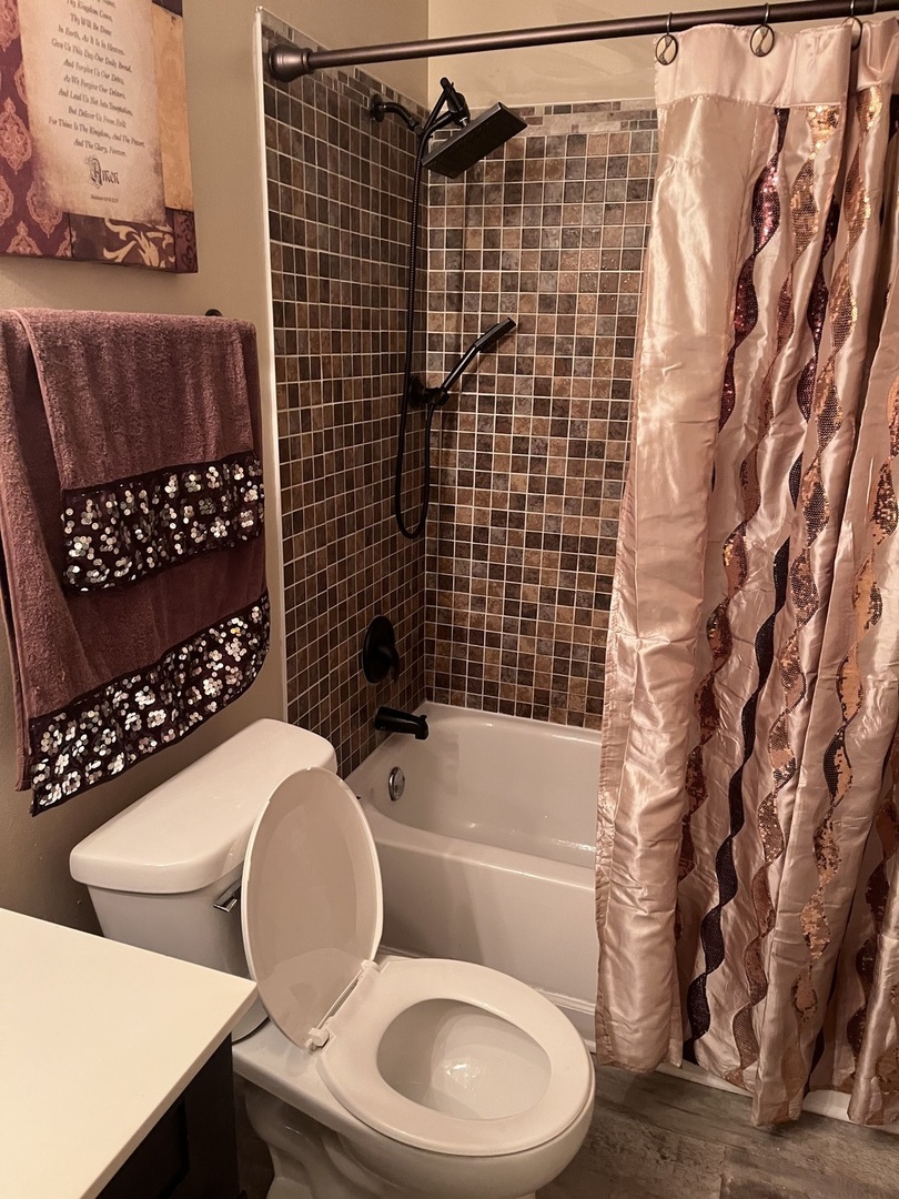 56 Timberlane Road Matteson, IL 60443 - Photo 38 of 40 a bathroom with a toilet and a shower curtain