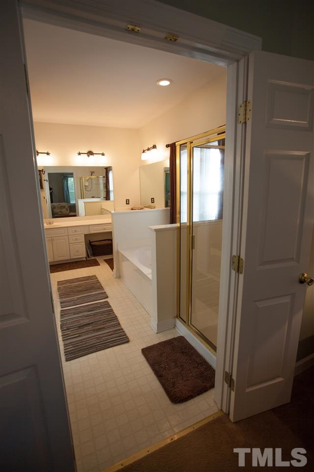 8820 Braceridge Road Raleigh, NC 27613 - Photo 14 of 22 Master Bath/Spa