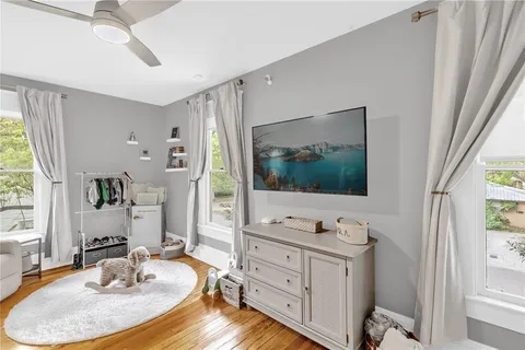 a bathroom with a sink a vanity and a mirror