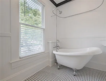 a bathroom with a sink and a bathtub