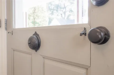 a view of backyard with garden and trees