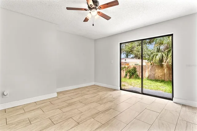a view of a room with a large window
