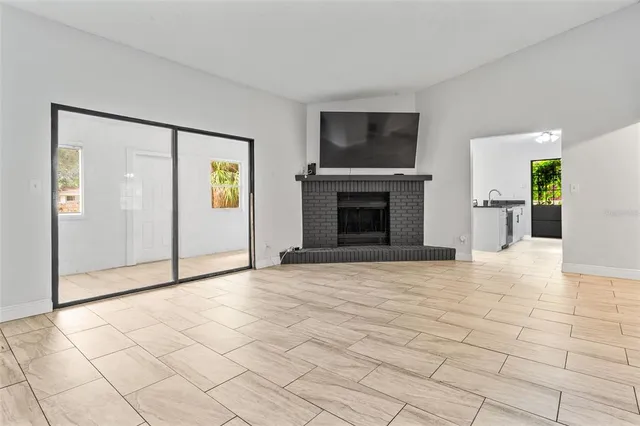 a view of a livingroom with a fireplace