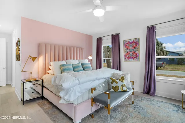 a bed room with a bed and a couch