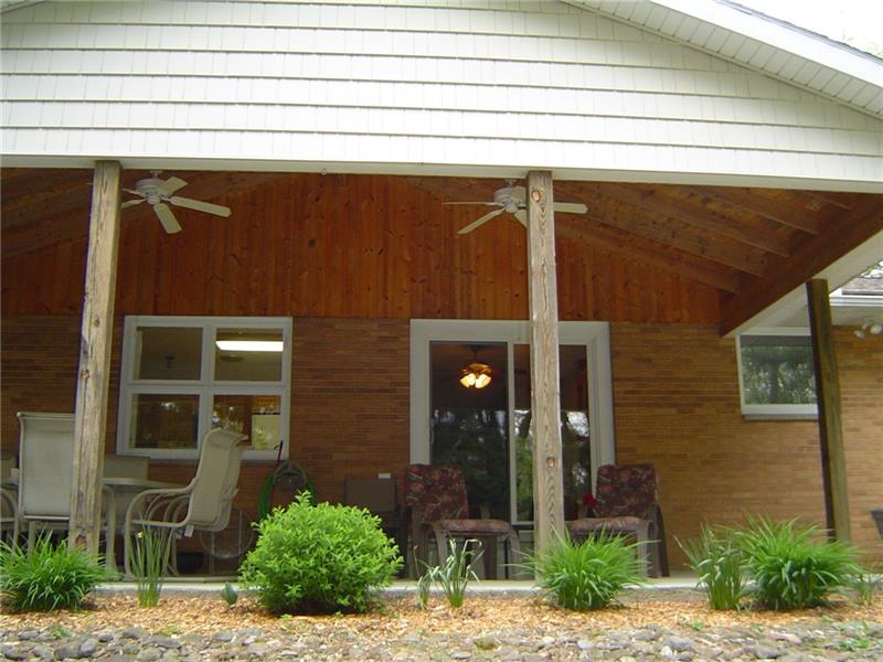 5055 Dutch Ridge Road Beaver, PA 15009 - Photo 16 of 20 This covered porch will be your sanctuary in the Summer time!