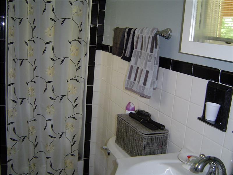 5055 Dutch Ridge Road Beaver, PA 15009 - Photo 9 of 20 Master bath has tiled walls and shower.
