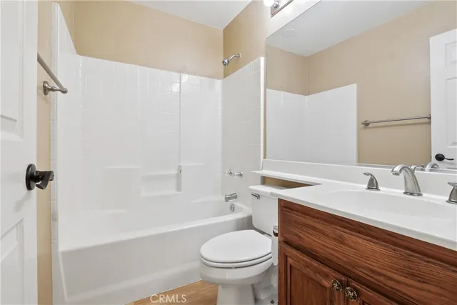 a bathroom with a sink a toilet and a bathtub