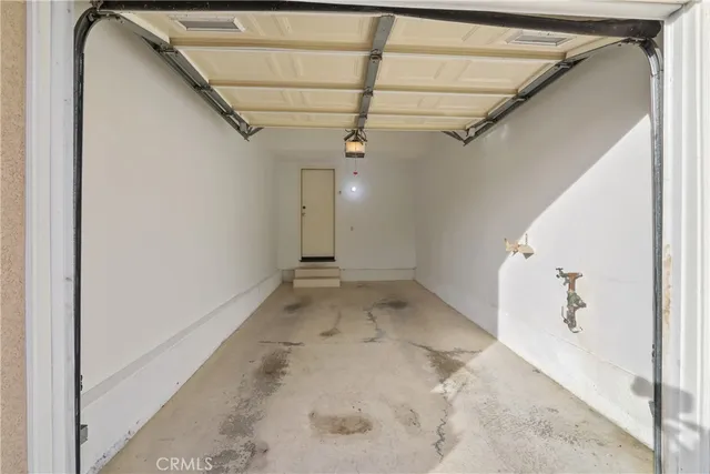 a view of a hallway with a white walls