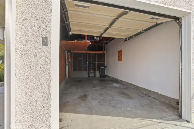 a view of a room with wooden walls