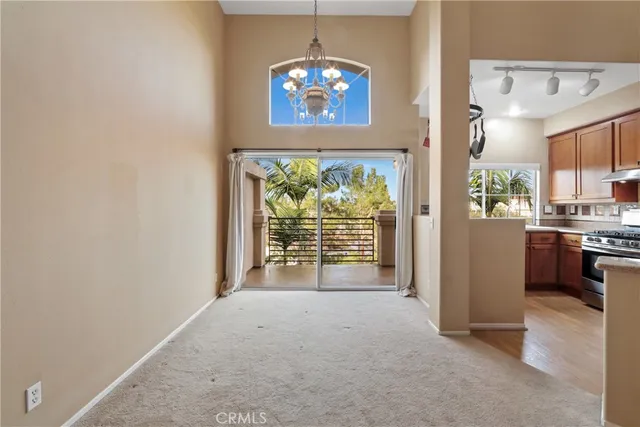 a view of a kitchen with a sink and a window