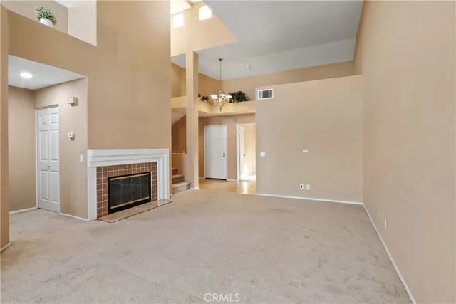 a view of a livingroom with a fireplace