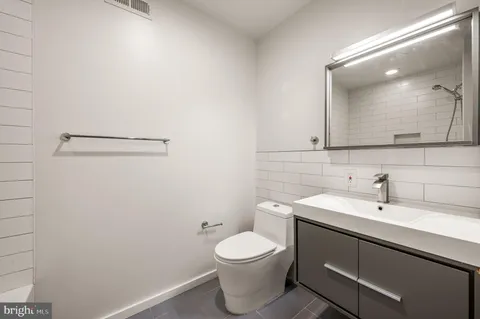 a workspace with furniture and window