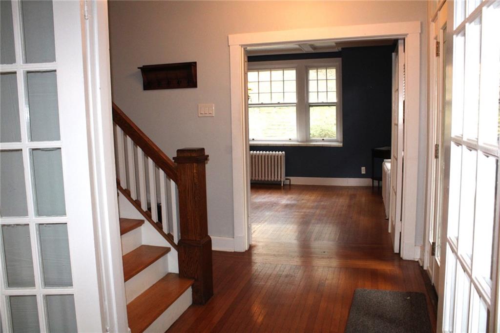 431 Locust Street Pittsburgh, PA 15218 - Photo 11 of 47 a view of entryway with wooden floor and stairs