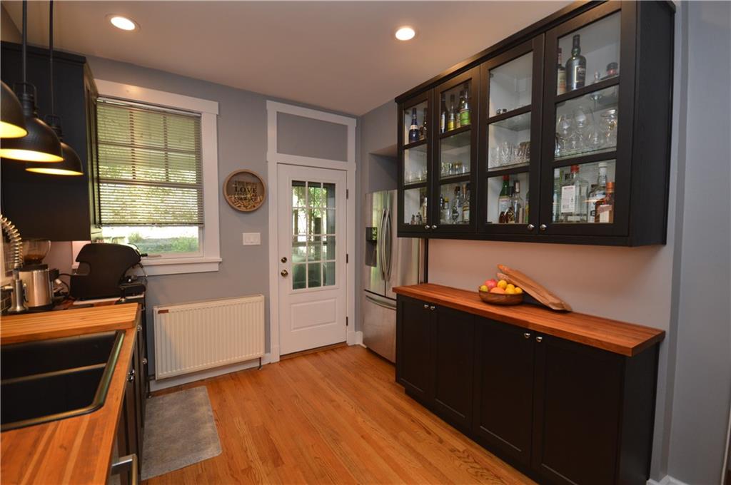 431 Locust Street Pittsburgh, PA 15218 - Photo 19 of 47 a view of a workspace with furniture and a window