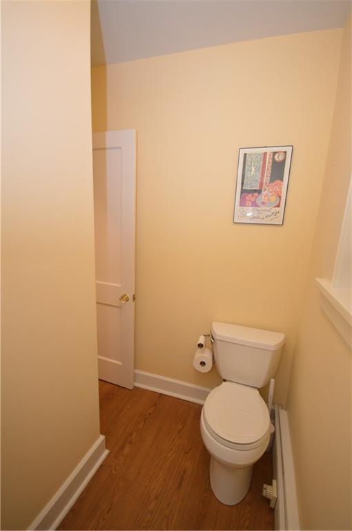 431 Locust Street Pittsburgh, PA 15218 - Photo 20 of 47 a white toilet sitting next to a white walls