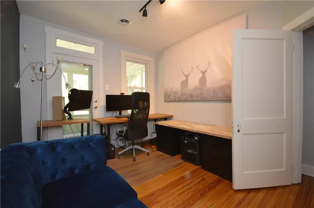 a living room with furniture and a window