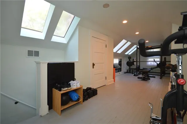 a view of living room with furniture and a flat screen tv