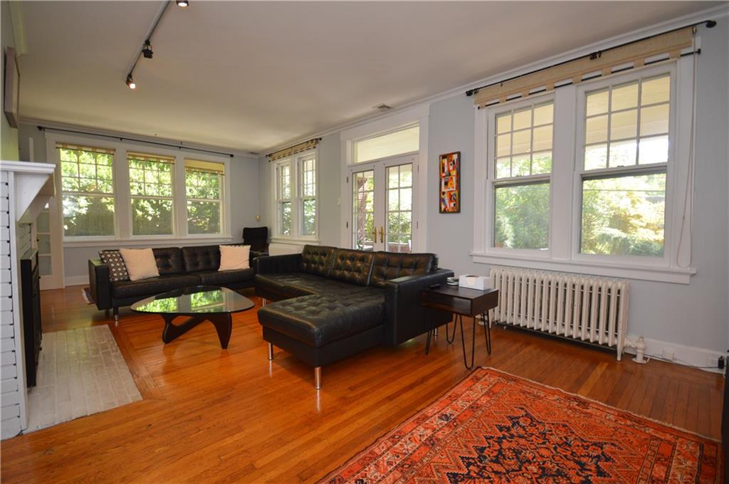 431 Locust Street Pittsburgh, PA 15218 - Photo 7 of 47 a living room with furniture and a window