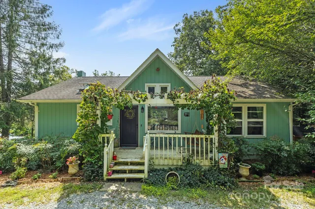 front view of a house with a garden