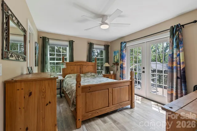 a bed room with a bed and a window