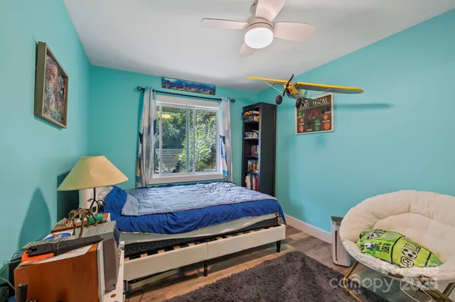 a bedroom with a bed and a closet