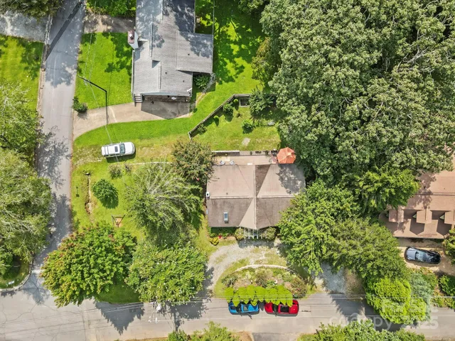 an aerial view of a house with a garden