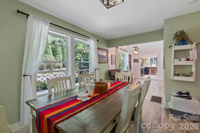 a room with furniture and a wooden floor