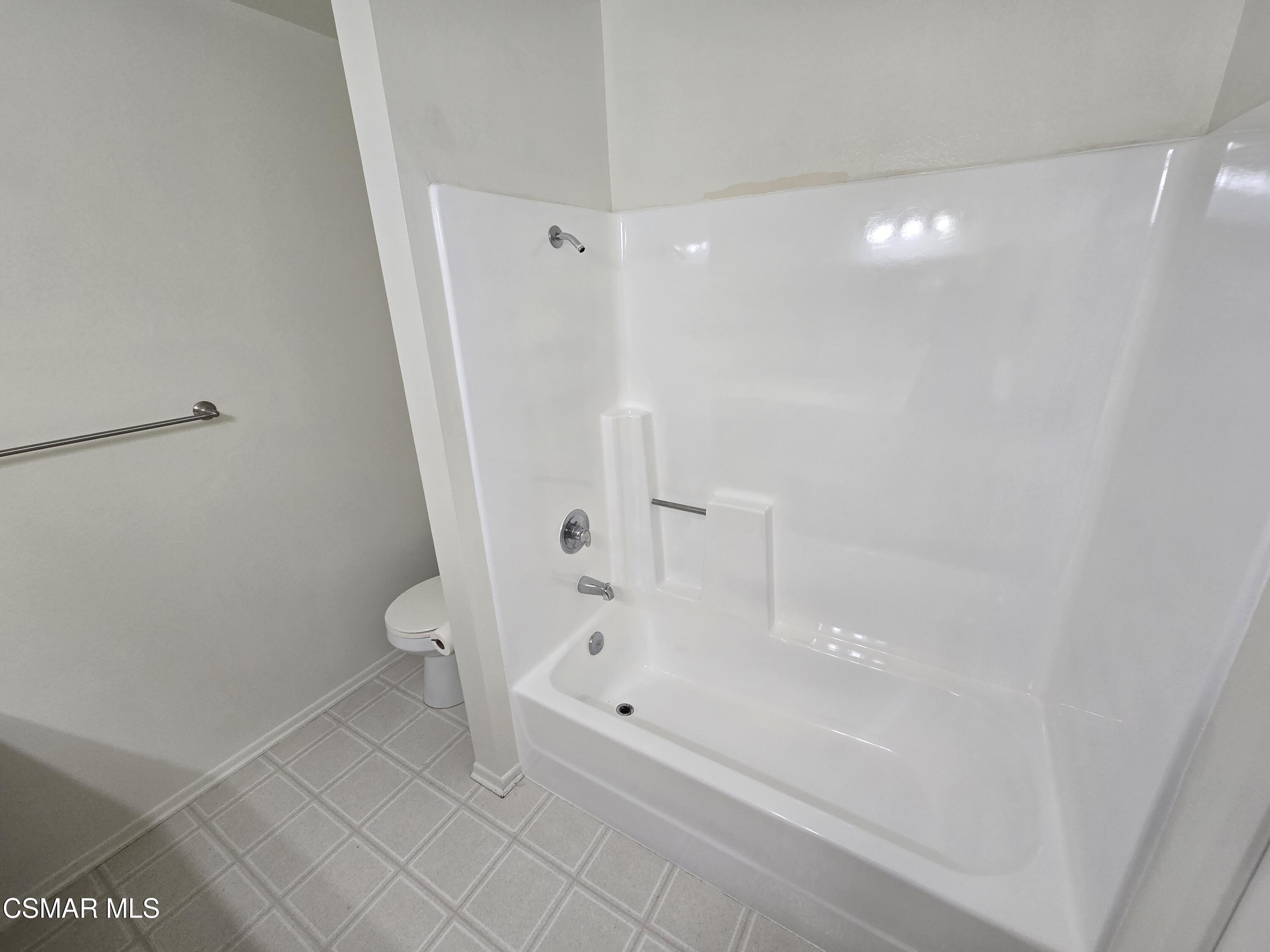 1778 Sinaloa Road, Unit 294 Simi Valley, CA 93065 - Photo 11 of 15 a bathroom with a bathtub and a shower