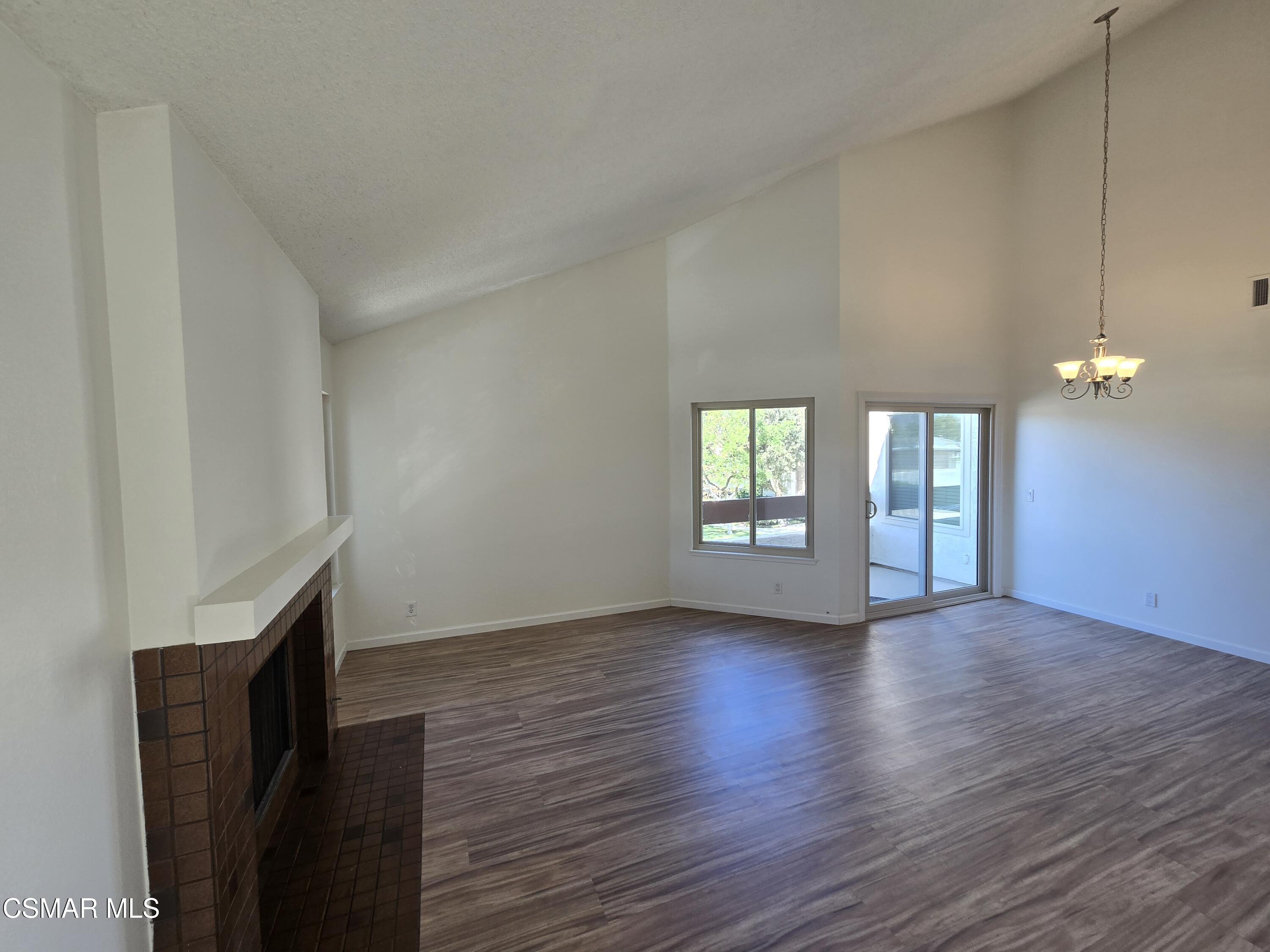 1778 Sinaloa Road, Unit 294 Simi Valley, CA 93065 - Photo 3 of 15 a view of an empty room with window and wooden floor