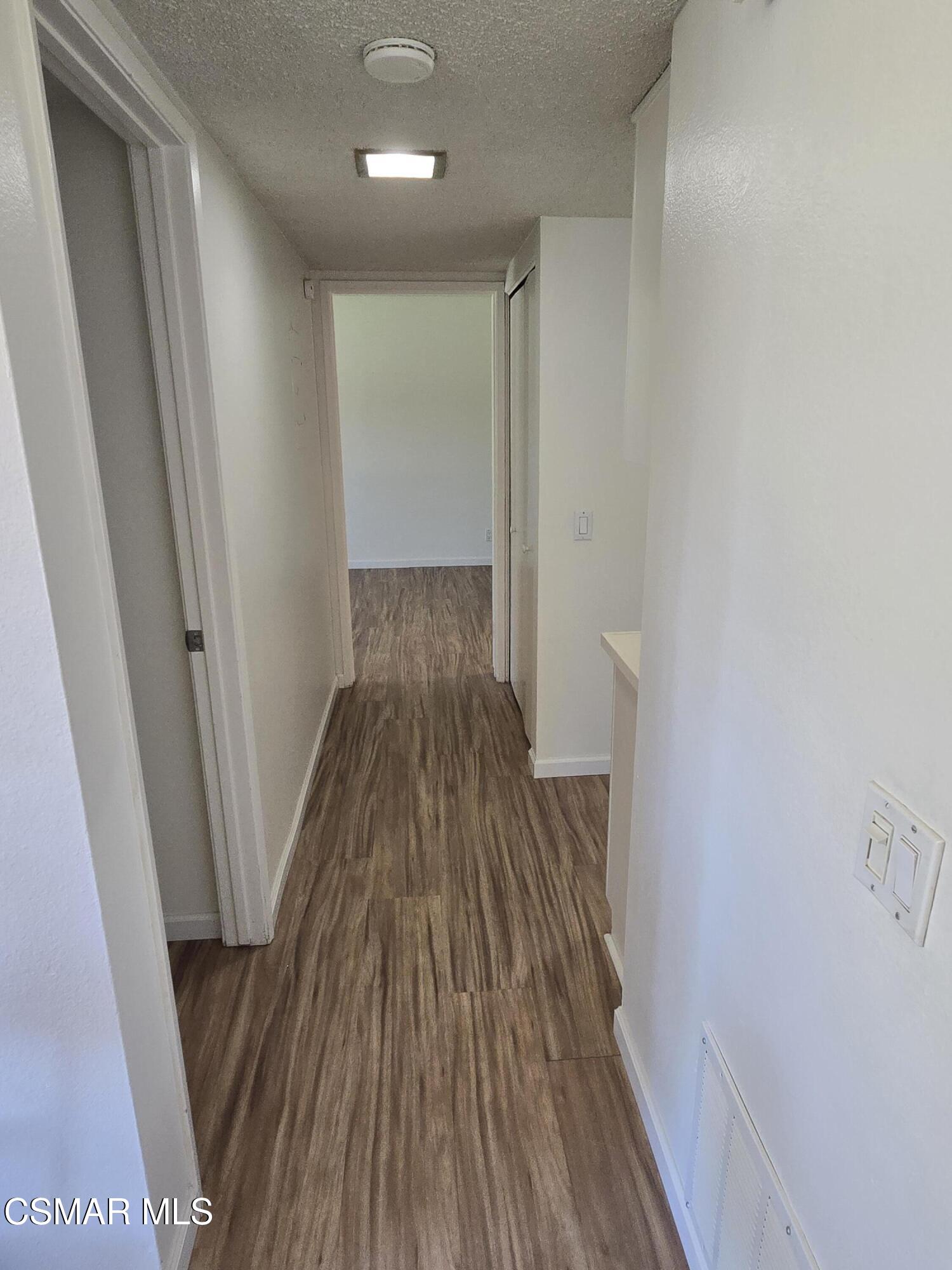 1778 Sinaloa Road, Unit 294 Simi Valley, CA 93065 - Photo 5 of 15 a view of wooden floor in a room