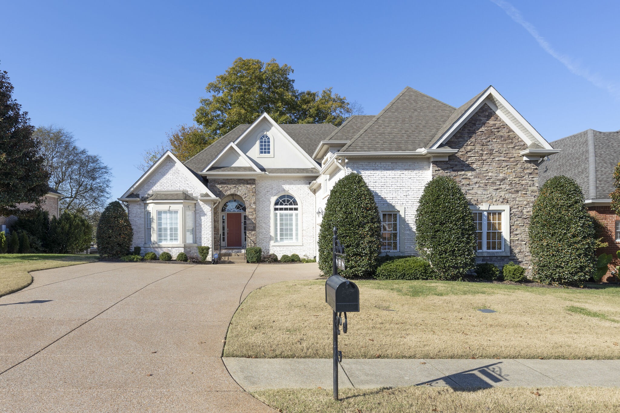 69 Blue Ridge Trace Hendersonville, TN 37075 - Photo 2 of 50 a front view of a house with garden