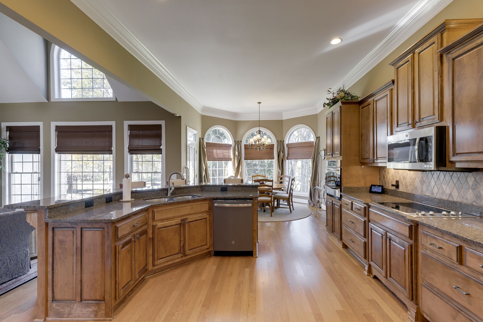 69 Blue Ridge Trace Hendersonville, TN 37075 - Photo 13 of 50 a large kitchen with stainless steel appliances granite countertop a stove and a sink