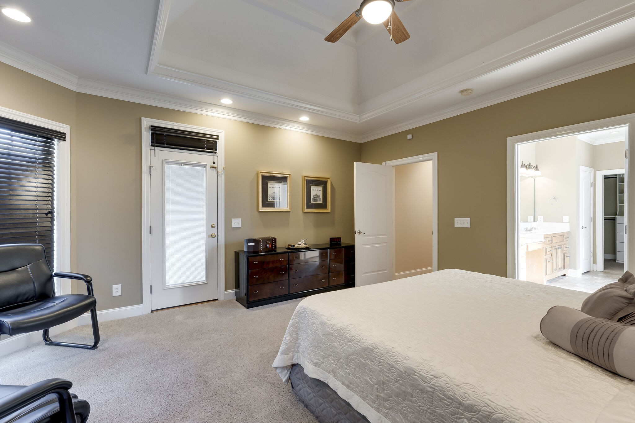 69 Blue Ridge Trace Hendersonville, TN 37075 - Photo 22 of 50 a bedroom with a bed and a chandelier