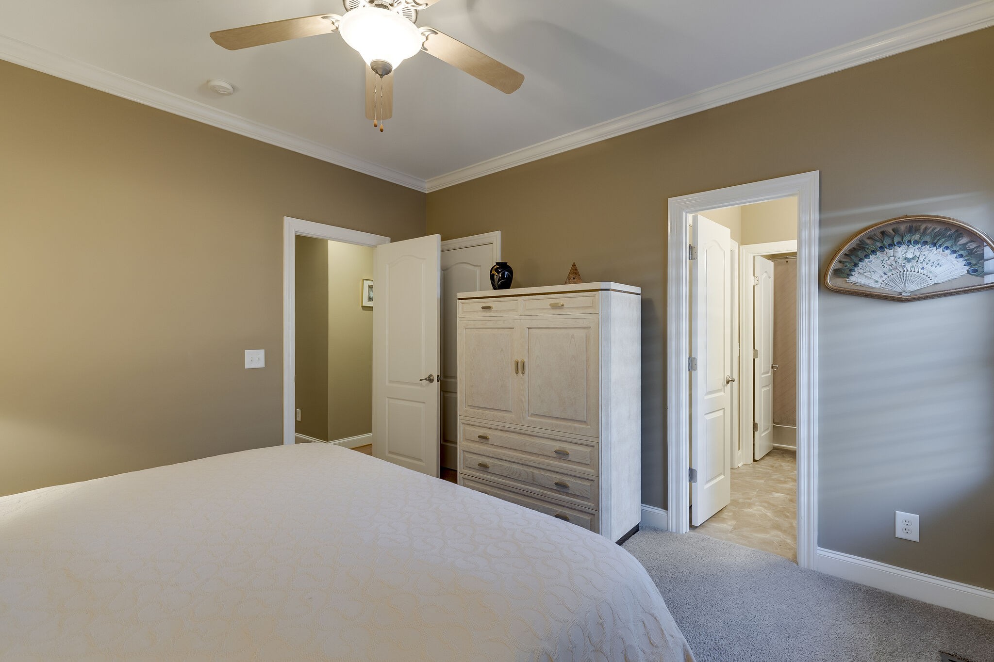 69 Blue Ridge Trace Hendersonville, TN 37075 - Photo 29 of 50 a bedroom with a bed and a chandelier