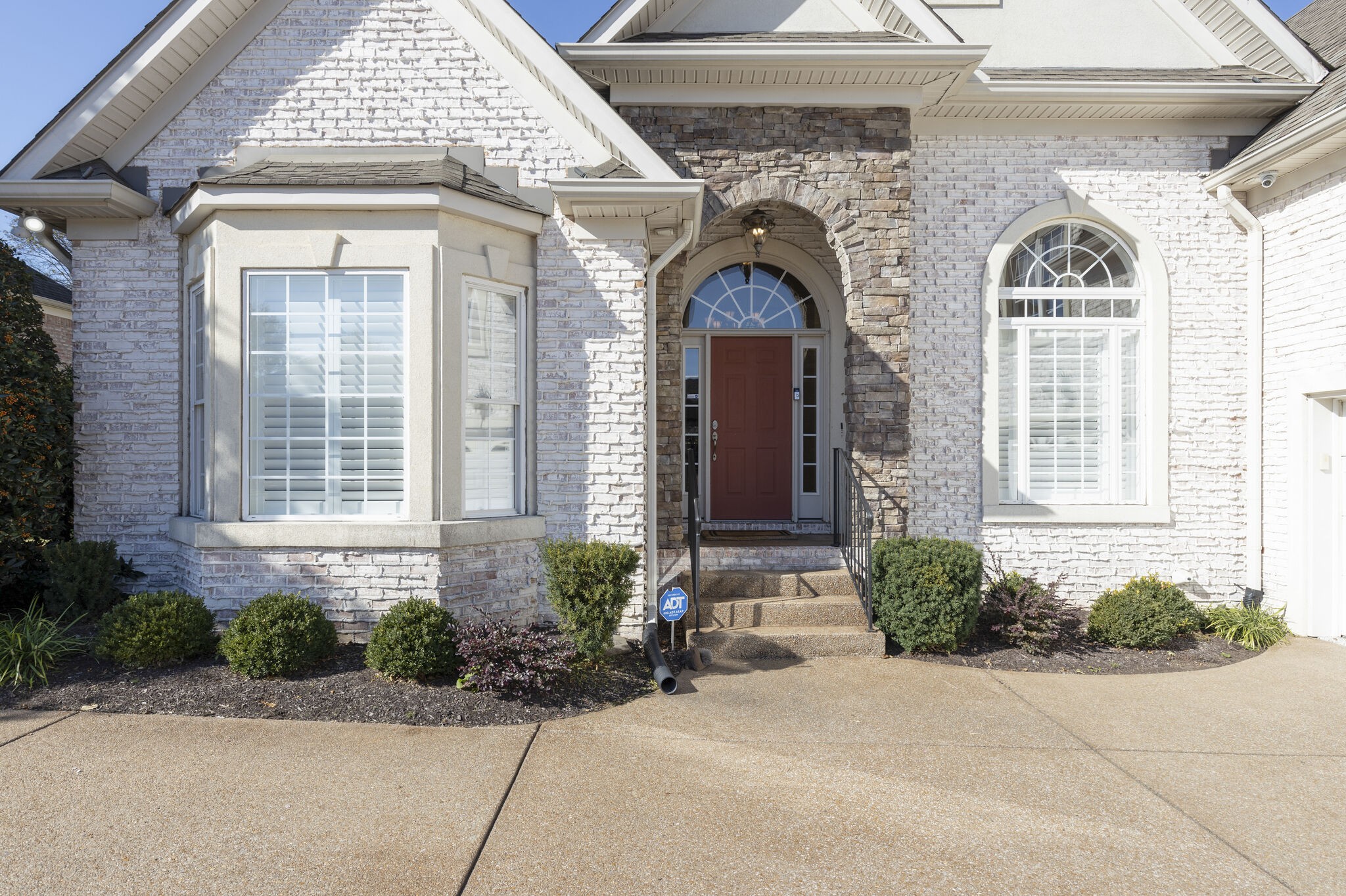 69 Blue Ridge Trace Hendersonville, TN 37075 - Photo 4 of 50 a front view of a house with a yard