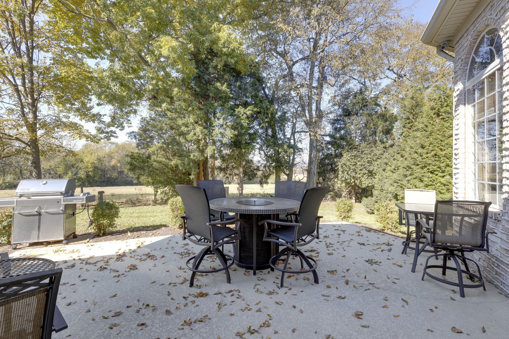 69 Blue Ridge Trace Hendersonville, TN 37075 - Photo 43 of 50 a view of a dinning table and chairs in the patio