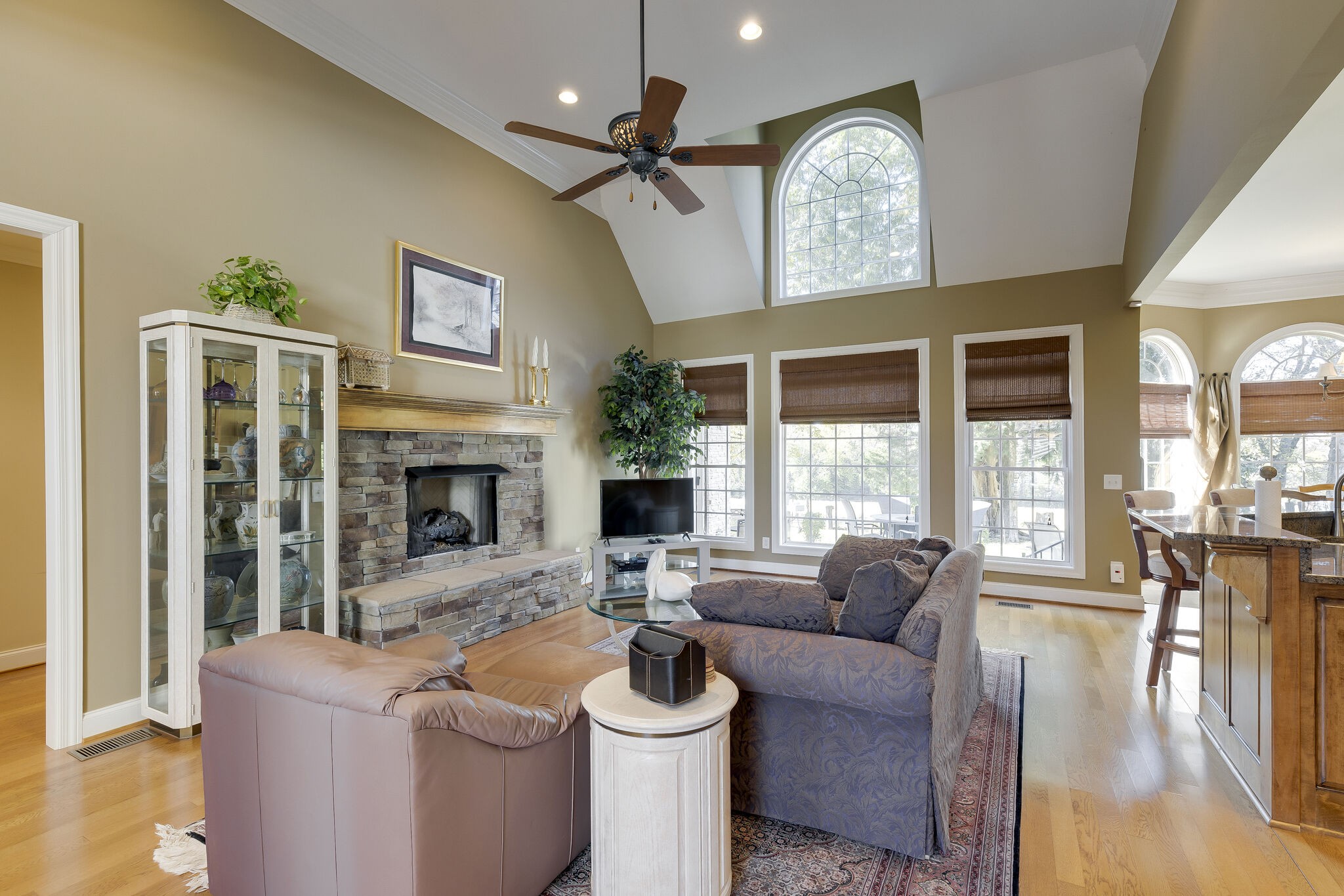 69 Blue Ridge Trace Hendersonville, TN 37075 - Photo 9 of 50 a living room with furniture a fireplace and a large window