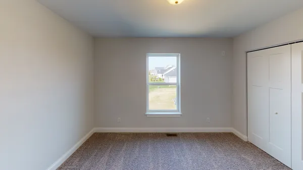 an empty room with a window