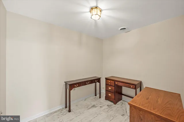 a view of a hallway with closet