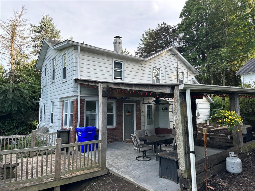 173 Portman Road Butler, PA 16002 - Photo 1 of 19 a view of a house with wooden deck and furniture