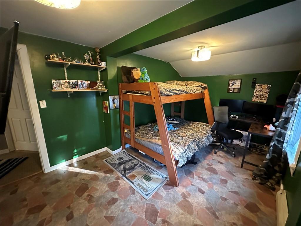 173 Portman Road Butler, PA 16002 - Photo 16 of 19 a bedroom with furniture and a flat screen tv