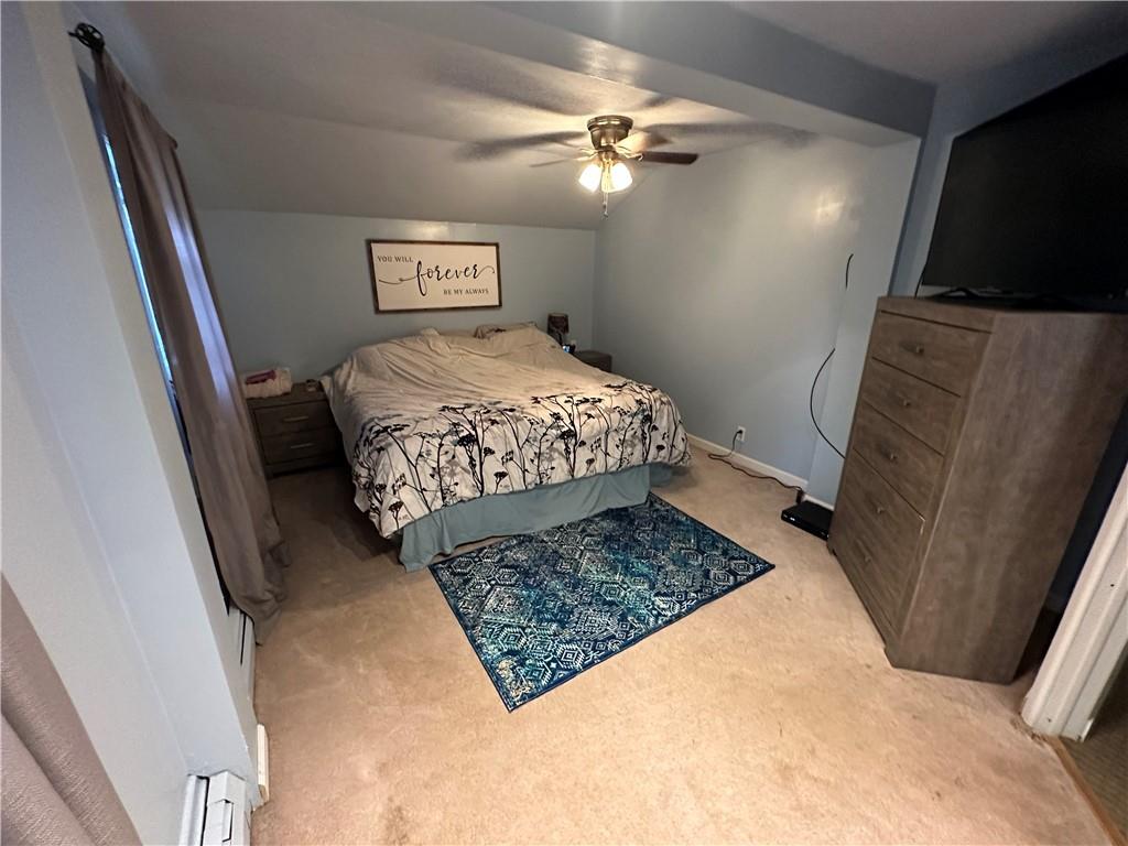 173 Portman Road Butler, PA 16002 - Photo 18 of 19 a bedroom with a bed and a mirror