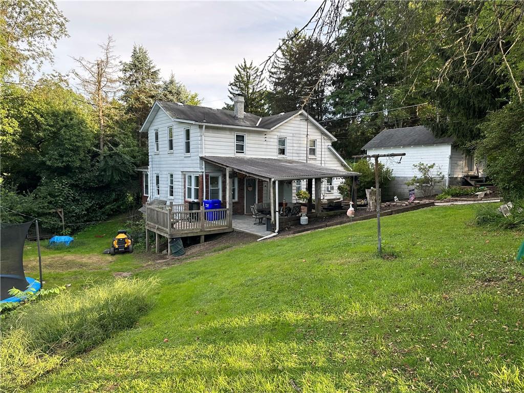173 Portman Road Butler, PA 16002 - Photo 3 of 19 a view of an house with backyard space and balcony