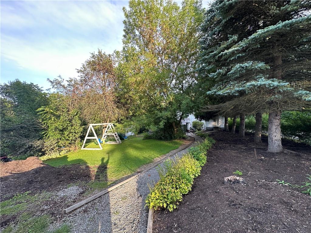 173 Portman Road Butler, PA 16002 - Photo 7 of 19 a view of a backyard with swimming pool