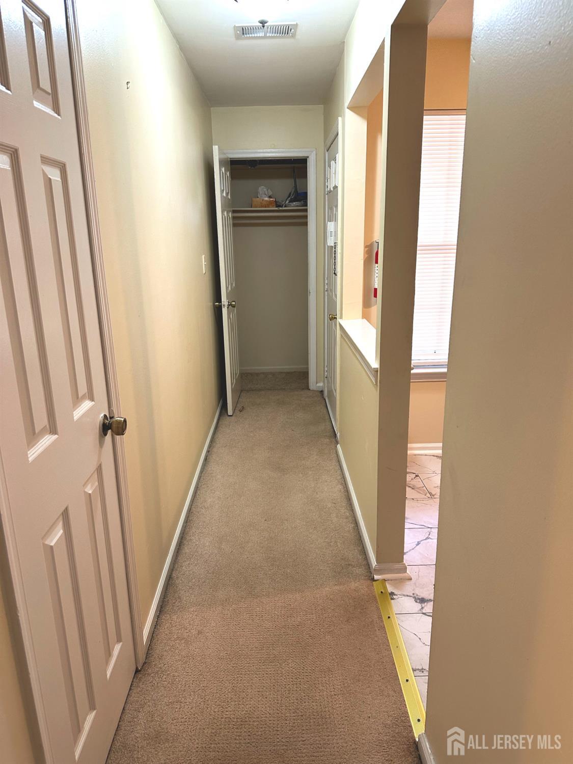 603 Woodbridge Commons Way Iselin, NJ 08830 - Photo 3 of 14 a view of a hallway