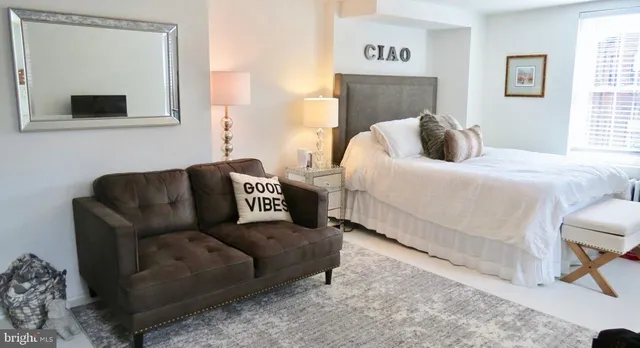 a living room with furniture and a couch