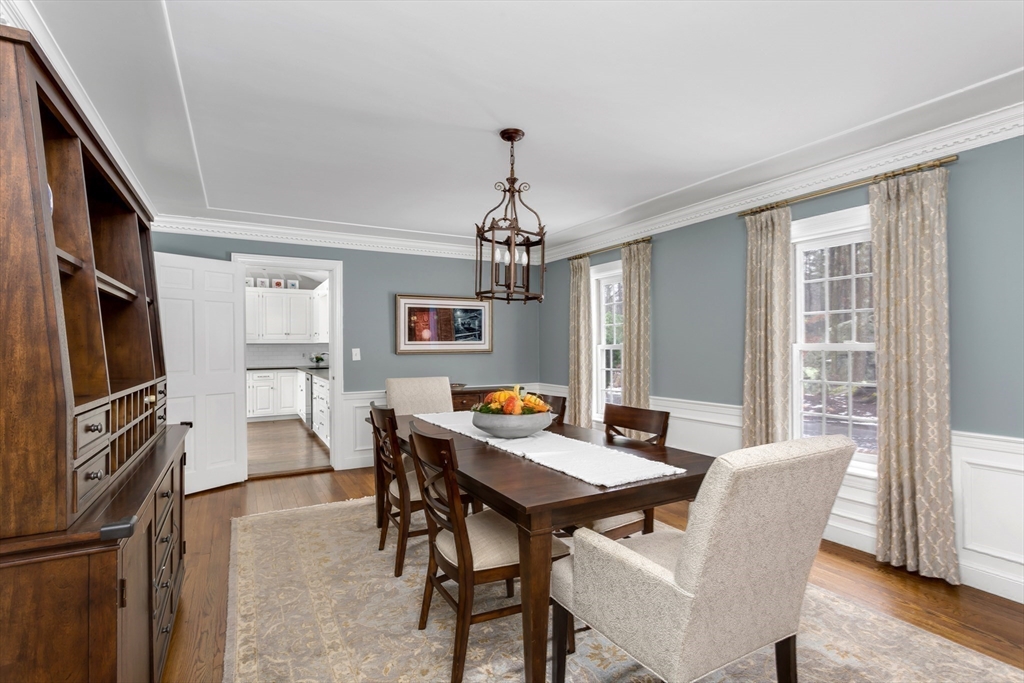 138 Pine Street Dover, MA 02030 - Photo 11 of 38 a view of a dining room with furniture window and wooden floor