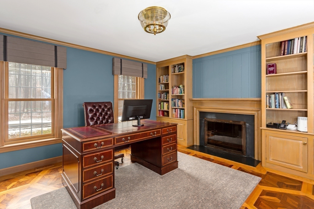 138 Pine Street Dover, MA 02030 - Photo 15 of 38 a view of a livingroom with furniture and a fireplace