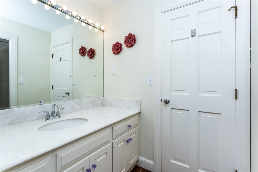 138 Pine Street Dover, MA 02030 - Photo 26 of 38 a bathroom with a sink vanity and mirror