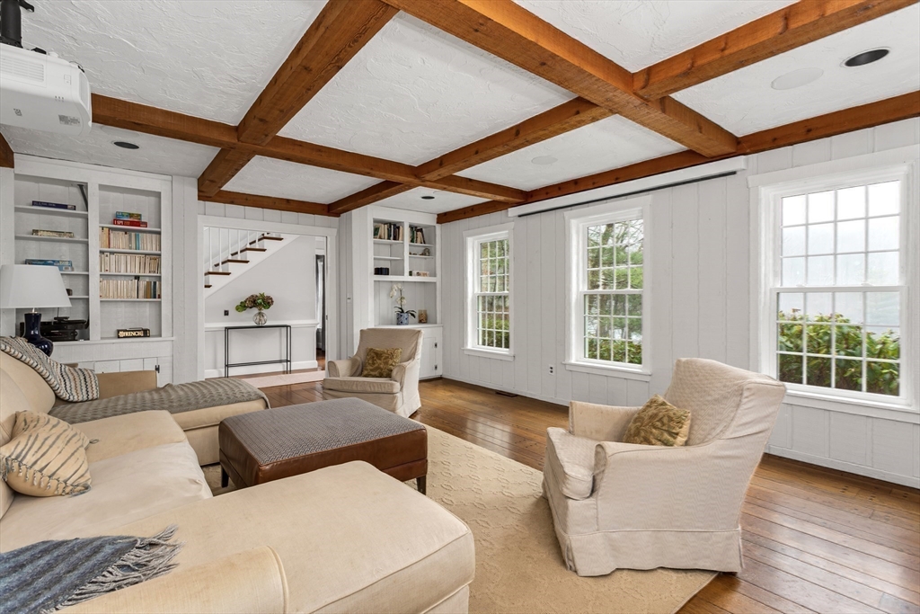 138 Pine Street Dover, MA 02030 - Photo 10 of 38 a living room with furniture and large windows